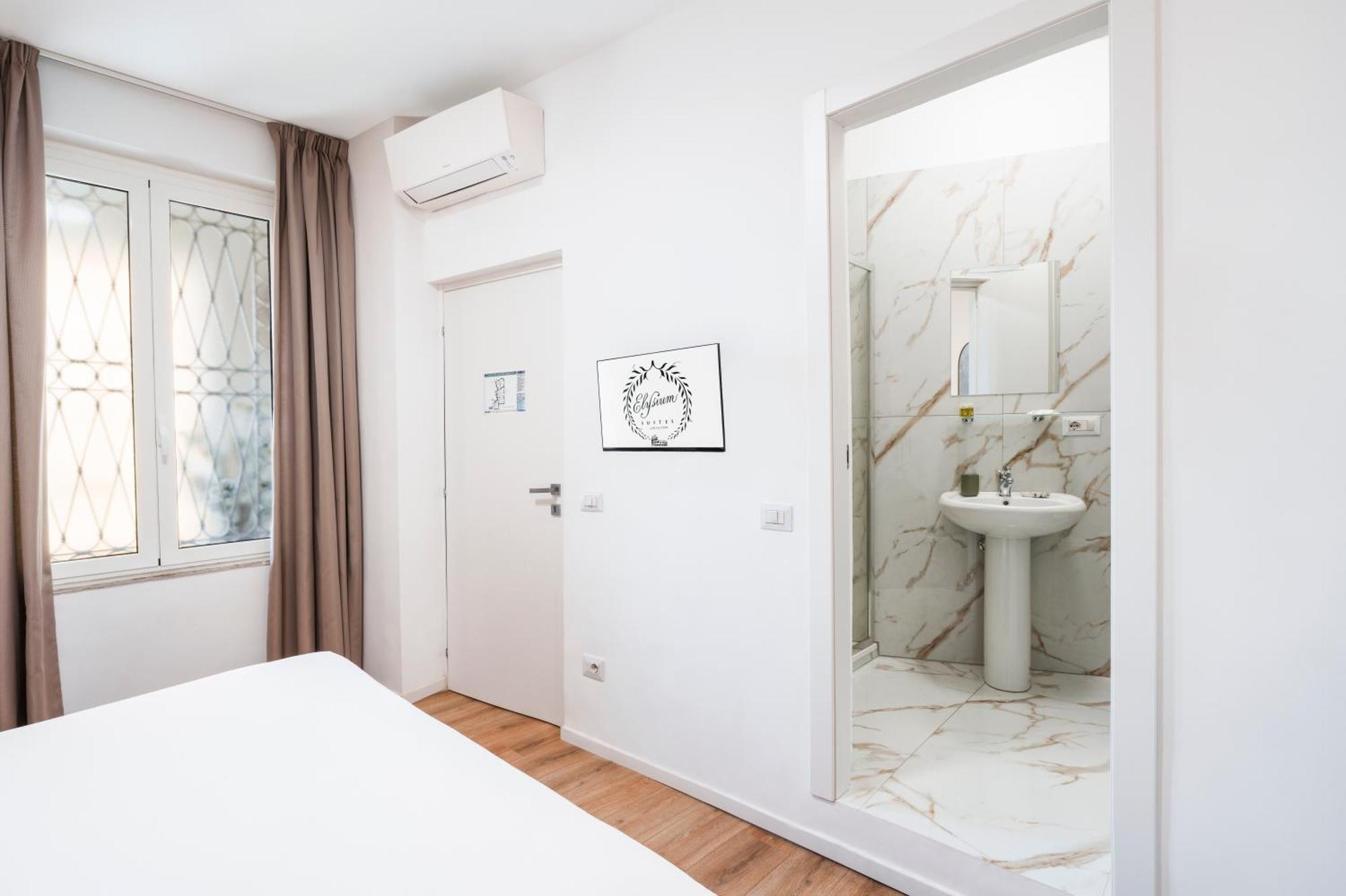 Elysium Suites Colosseo — Photos 3